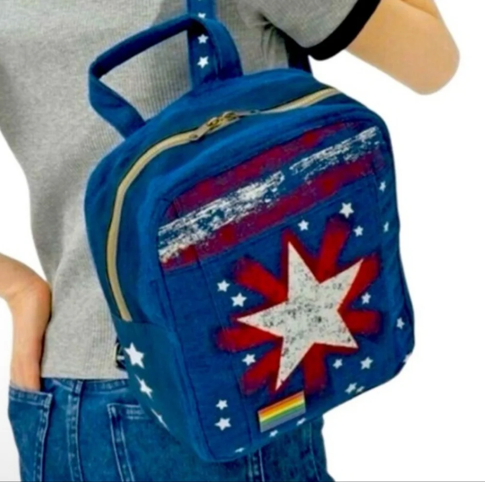 - DISNEY AMERICAN CHAVEZ MINI DENIM BACKPACK NWT